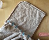 Eine Badeponcho für Lilli mit Toni Tintenfisch Applikation