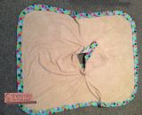 Eine Badeponcho für Lilli mit Toni Tintenfisch Applikation
