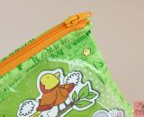 Einen Stoffbeutel als Ersatz für die kaputte Puzzle-Schachtel nähen. Platzsparend, kunterbunt und ordentlich aufgeräumt: Hallo Zipverpackt!