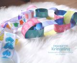 Bastelanleitung und Druckvorlage gestaltet als PDF-E-Book für eine Dekokette aus Papierstreifen zum Ausmalen, Schneiden üben und Basteln für Groß und Klein. Kringeling von shesmile.