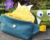Nähanleitung und Schnittmuster gestaltet als PDF-E-Book für eine Gürteltasche in 2 Größen mit großem Reißverschluss-Fach und Verschlussklappe HipPack von shesmile. Dein Lieblingstäschchen bestückt mit allem was du immer bei dir haben willst. 