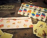 Kartenhalter KiddiCard aus Stoff. Eine Nähanleitung mit Schnittmuster von shesmile. Ideal für Unterwegs oder Zuhause. Aufgeklappt, zusammengesteckt, Spielkarten aus der intgegrierten Tasche rausgeholt und schon kann die Spielpartie losgehen. Ergebnis