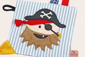 Applikationsvorlage gestaltet als PDF-E-Book von shesmile für den Piratenkopf Käptn Wildbart. Zur Gestaltung von Textilien.