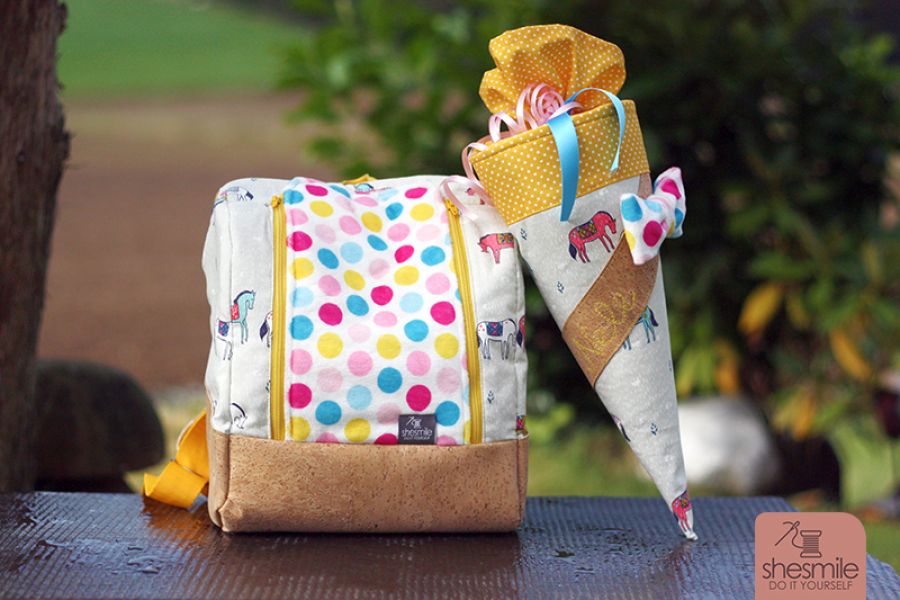 Wenn das kleine Kind plötzlich groß wird: Zum Kita-Start dürfen selbstgenähte Begleiter wie der KlapPack-Rucksack und eine Schultüte aus Stoff nicht fehlen.
